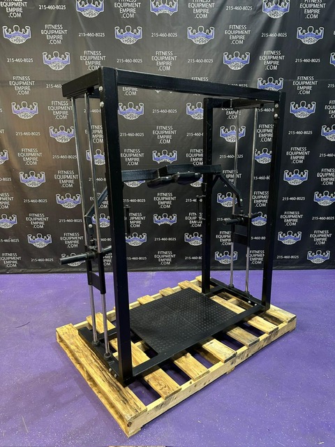 7f92fbd2-42d4-481a-bee6-3b2cd707032f.jpg The Natural Balance Squat Machine – Like New